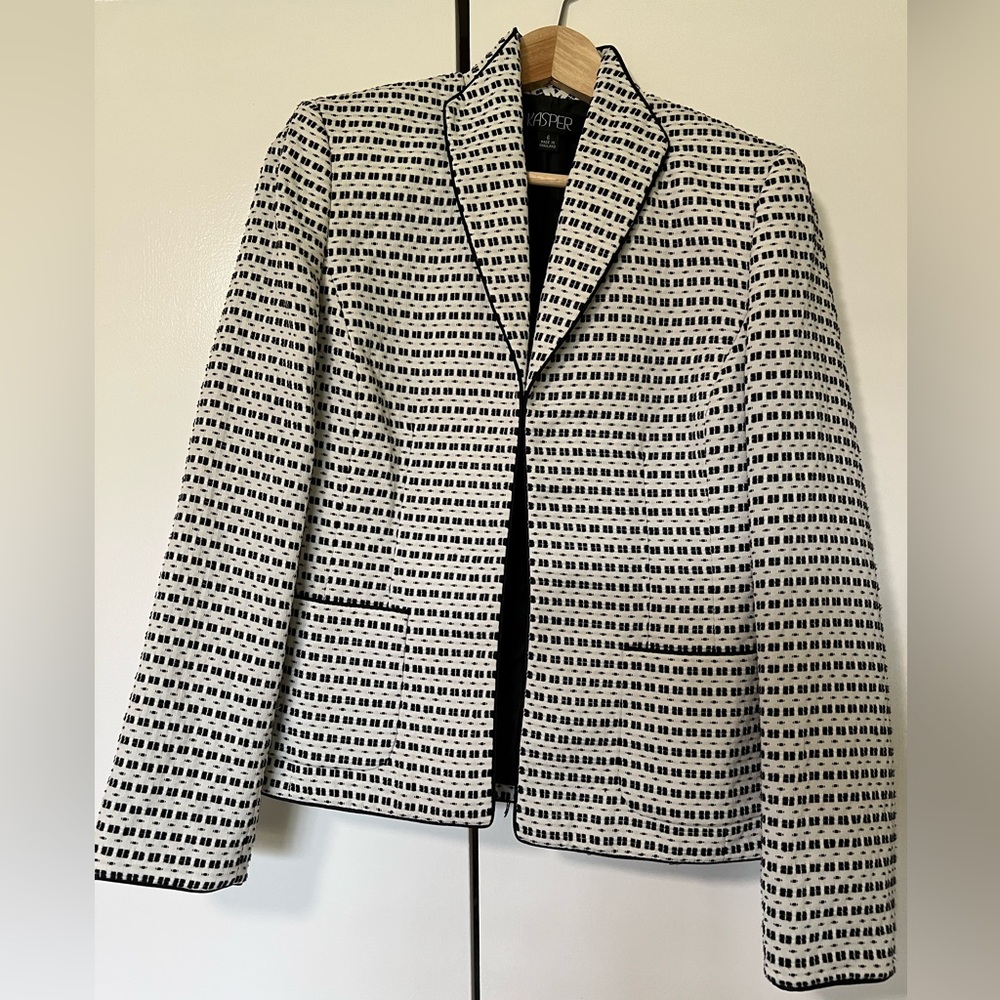 Creme and black suit jacket.
